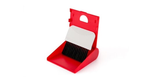 small red dustpan and computer brush